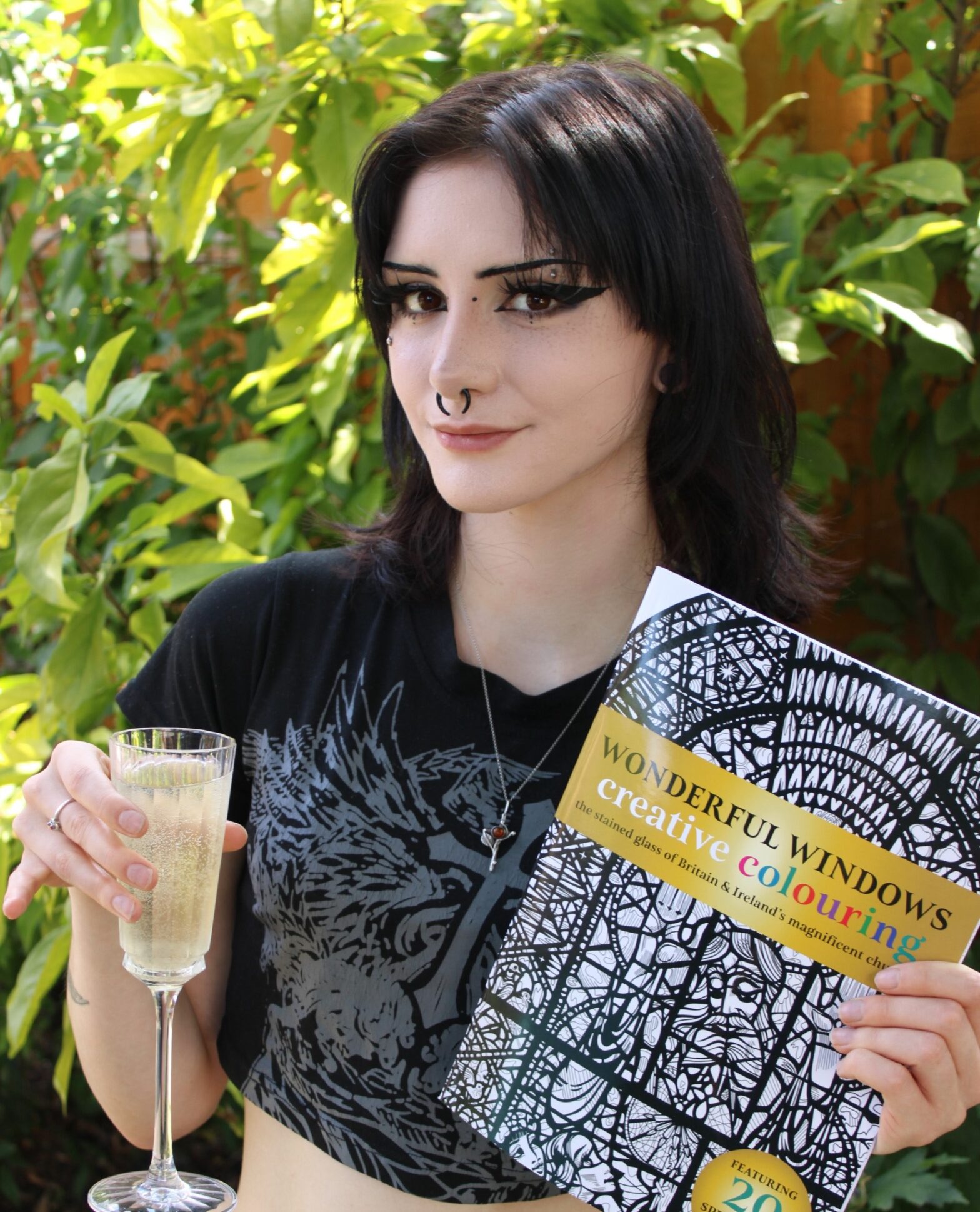 Evie Belle Humphries (pictured) illustrated all the drawings in the Wonderful Windows Creative Colouring book on stained glass