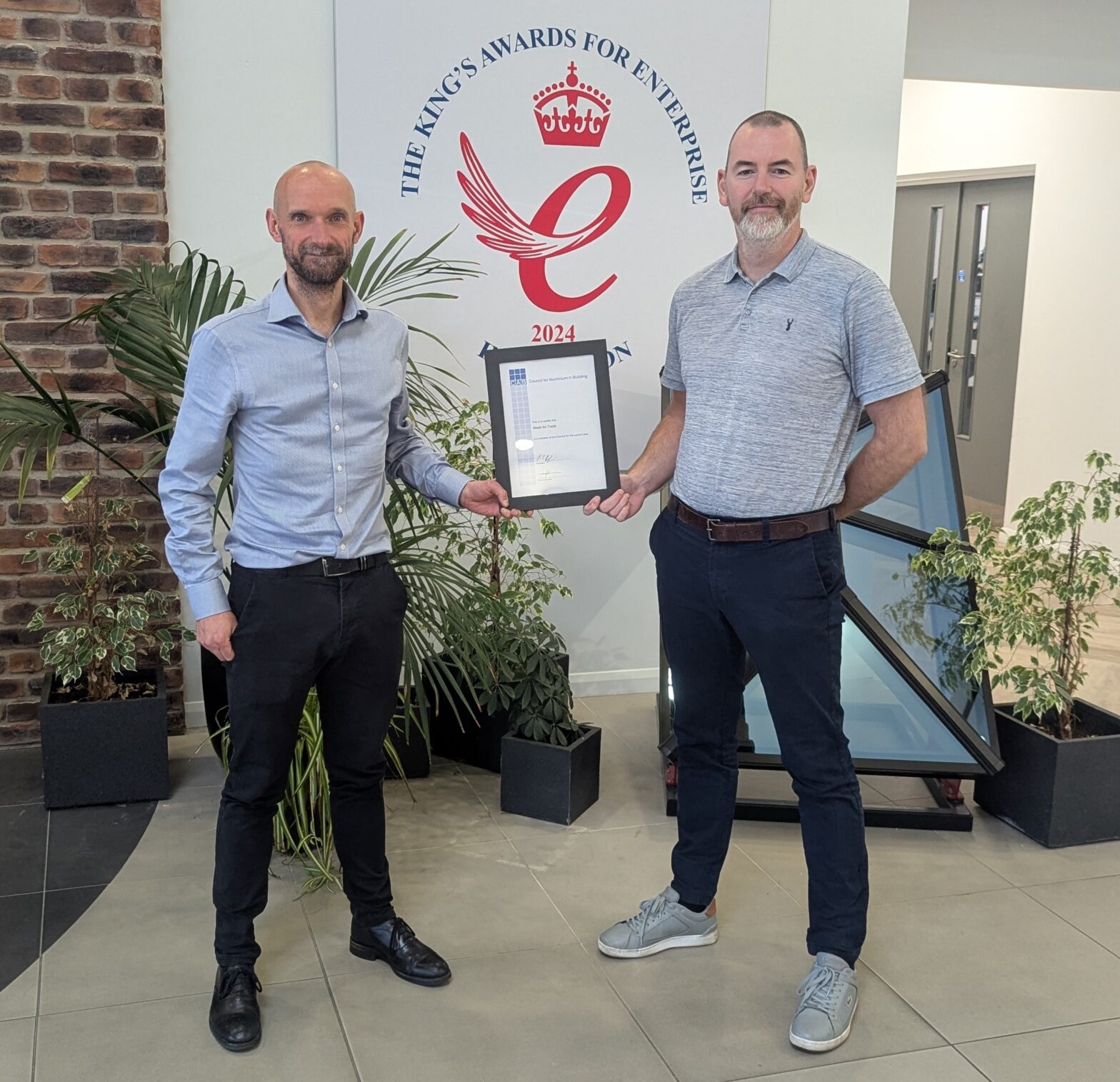 Chris Wann and Gavin Herdman of MFT celebrating joining CAB