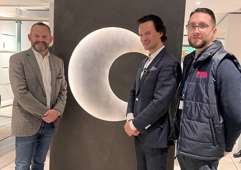 George Lewis aongside Origin's Darren James and Ben Brocklesby