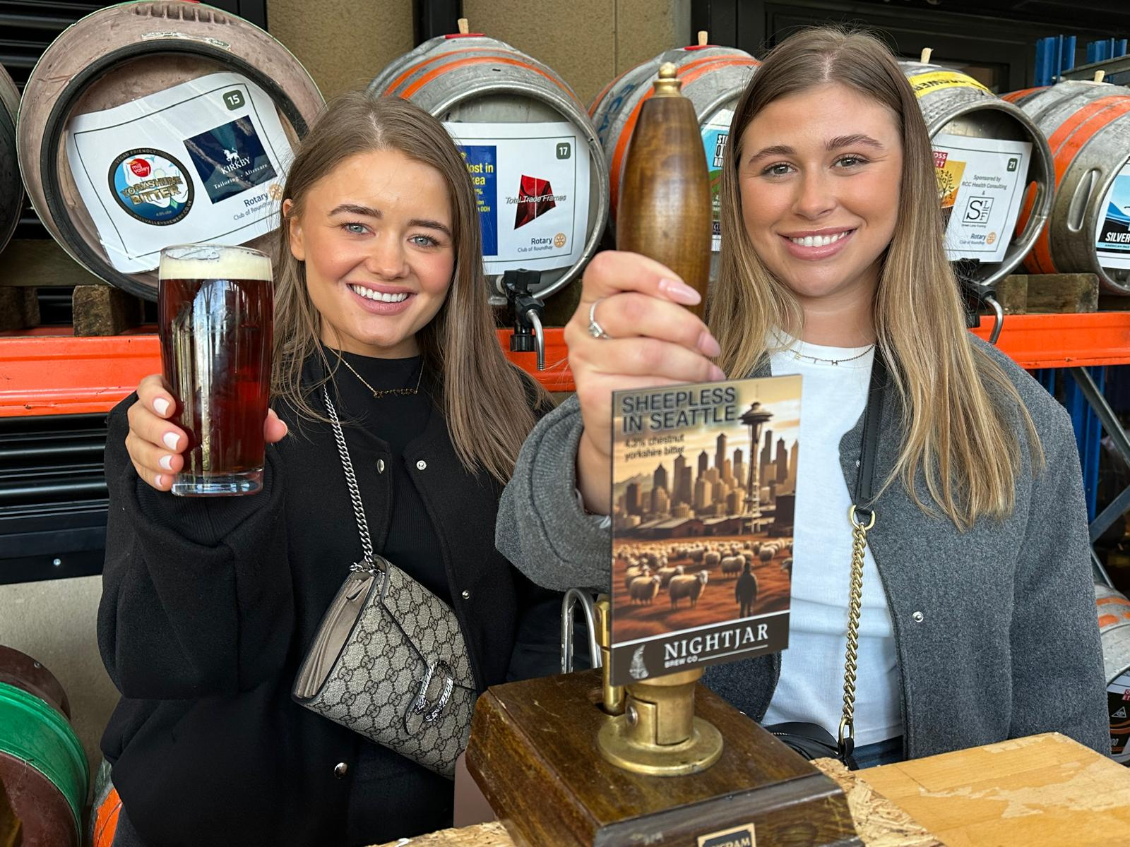 Morley Glass’s Charlotte Gilbert, Marketing Assistant, with Beth Mackay, Office Administrator, at a previous North Leeds Charity Beer Festival