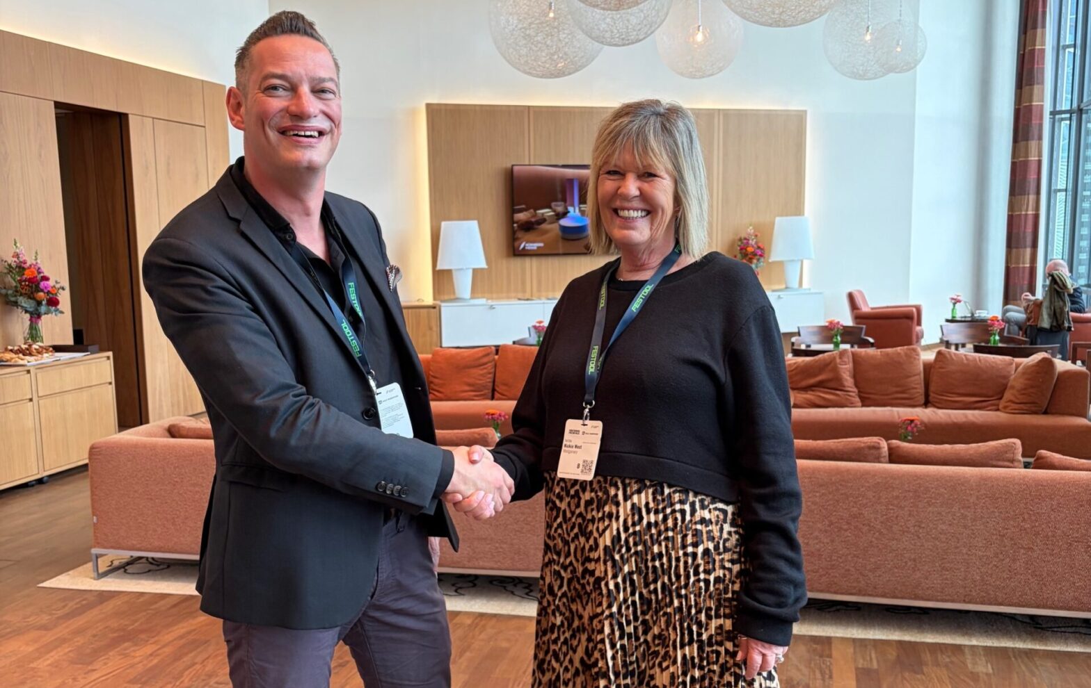 Hendrik Taise of BALLAND Messe-Vertrieb with FIT Show's Nickie West